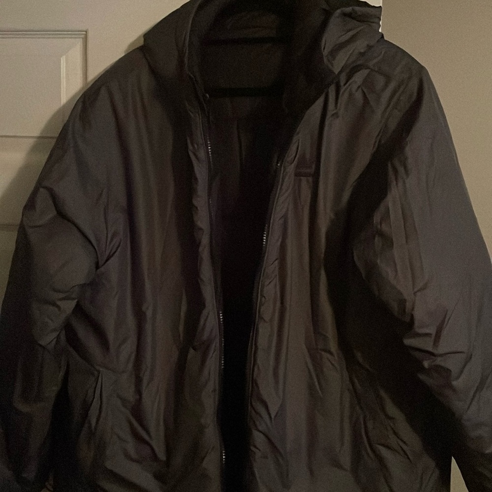 Black and gray reversible winter coat